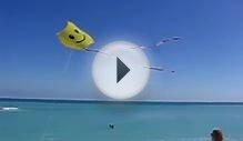 flying a smiley face kite in south beach miami beach